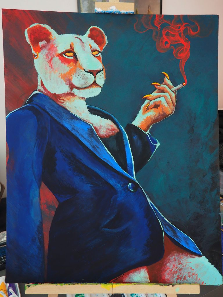 a photo of a painting on an easel, depicting an anthropormorphic lioness in bright hues on an abstract background. she is wearing a blazer and holds a cigarette in her raised hand, which sports golden claws. the cigarette's smoke is vibrant red